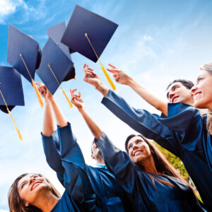 Students throwing graduation hats Students throwing graduation hats